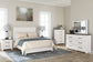 Gerridan Queen Panel Bed with Mirrored Dresser, Chest and 2 Nightstands